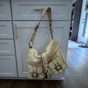 Leather Coach purse *cream colored* with heavy buckles